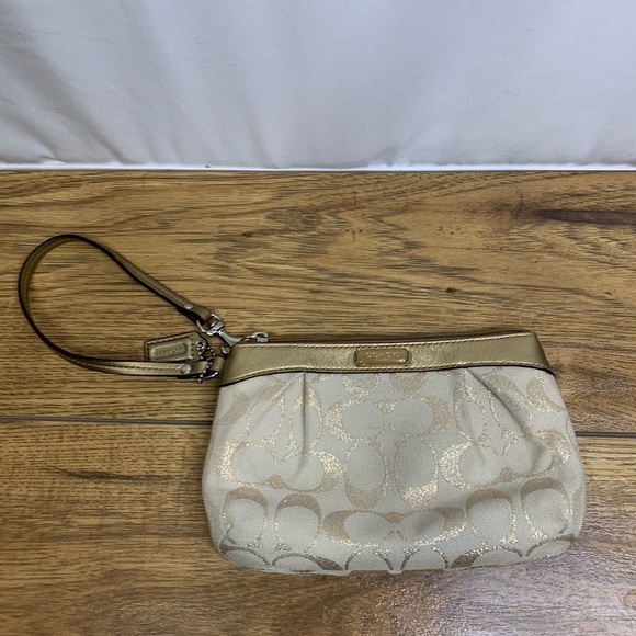 Coach Handbags - 🍾COACH champagne wristlet. New condition.
